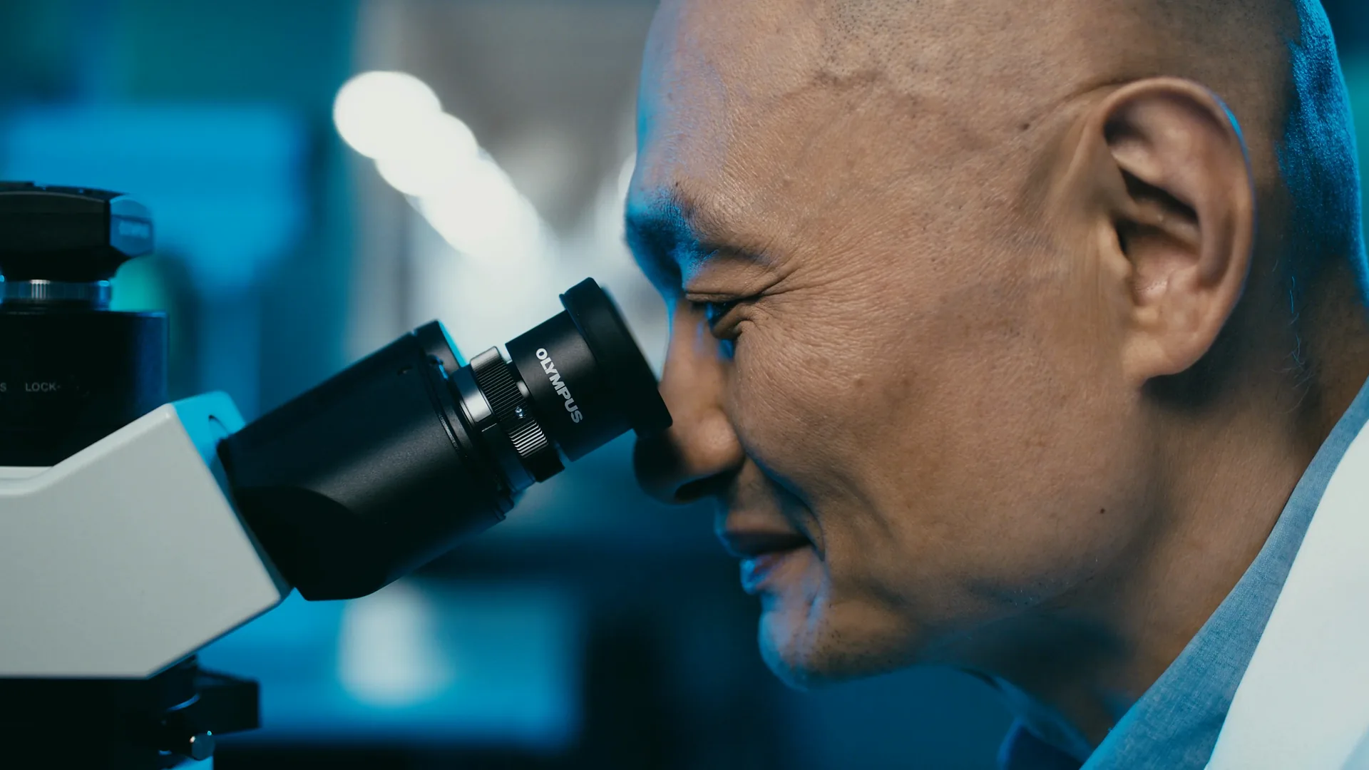Scientist at a microscope