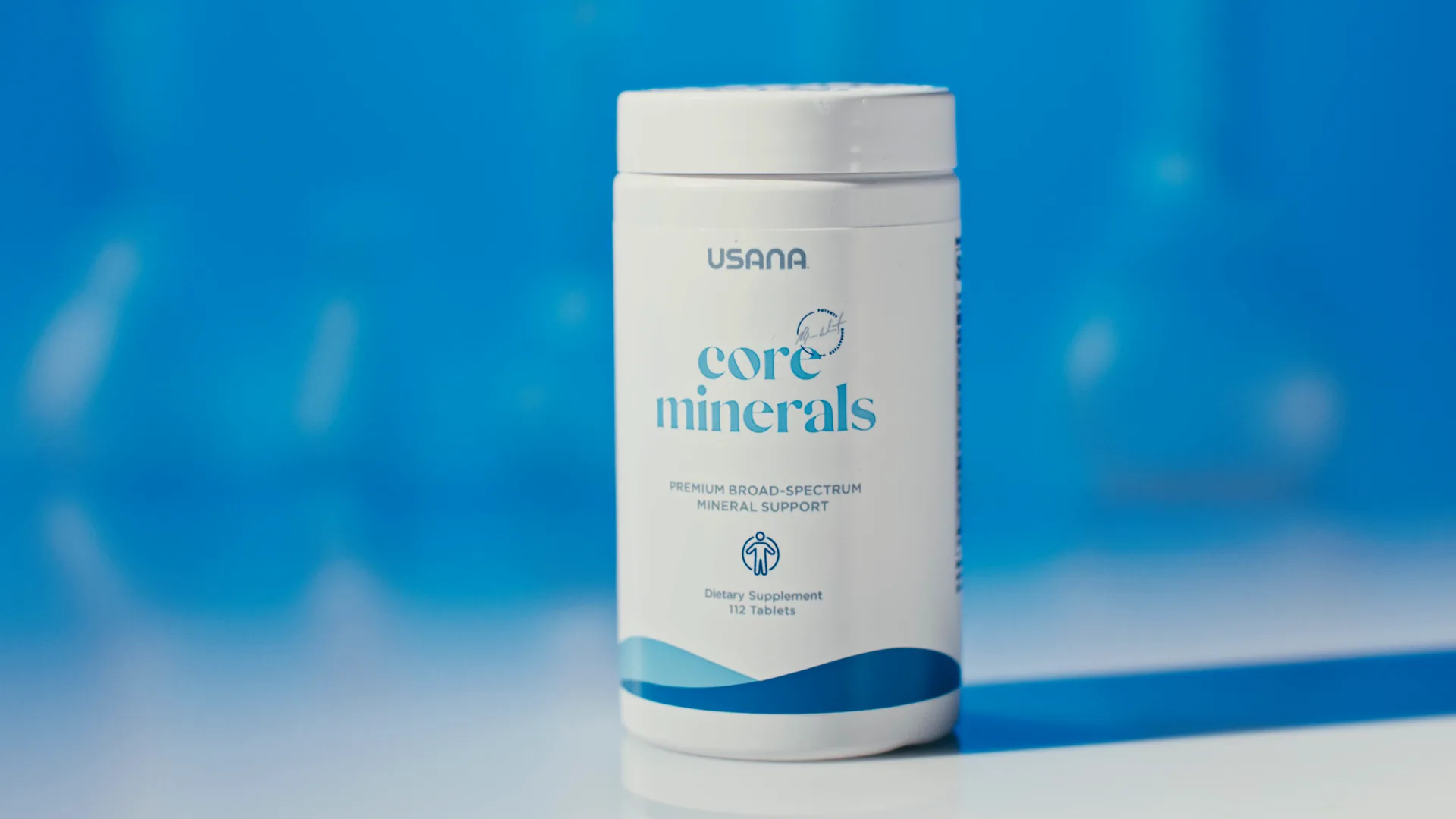 Core Minerals bottle on blue