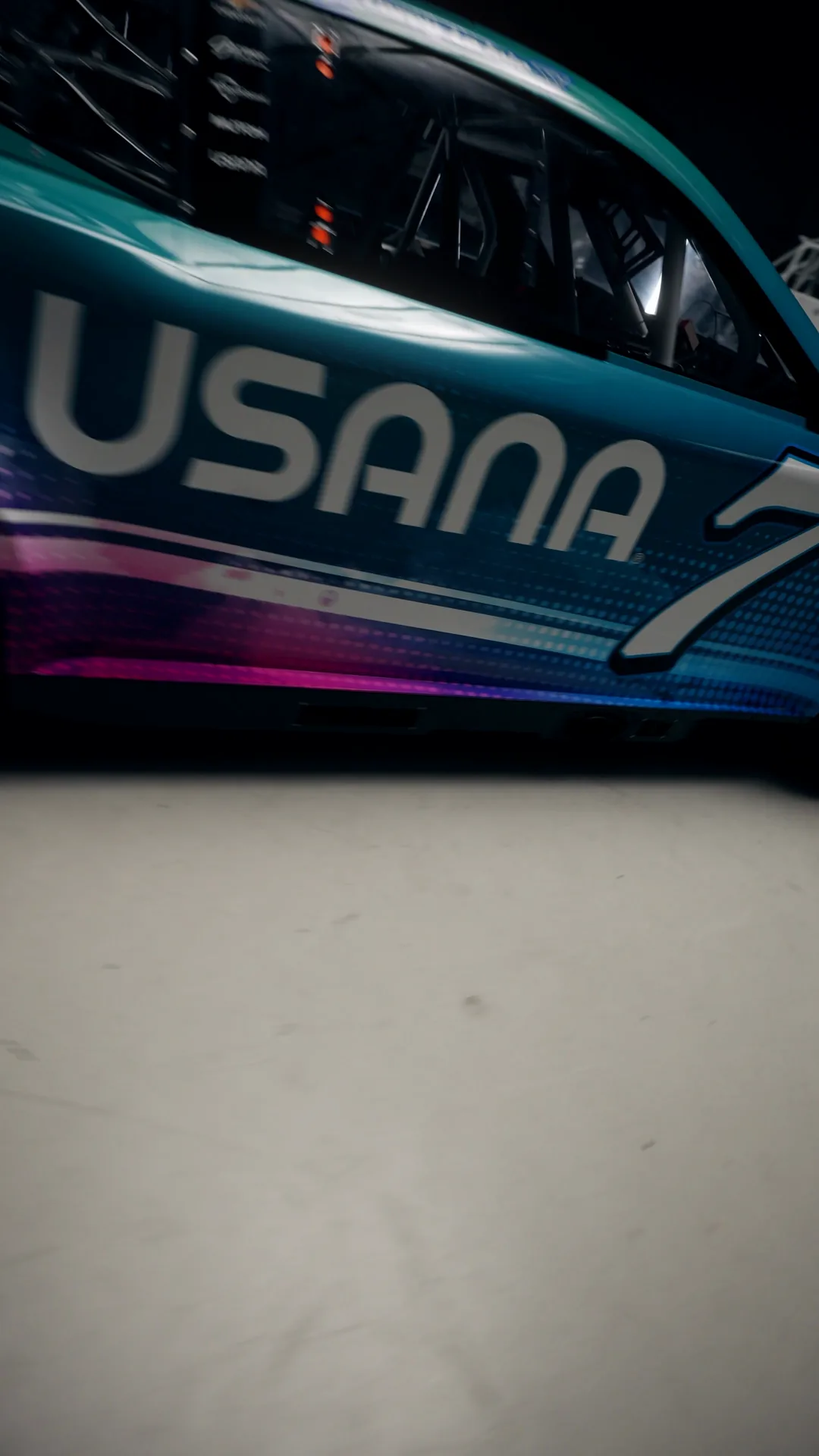 USANA and the number 7 along the side of the car