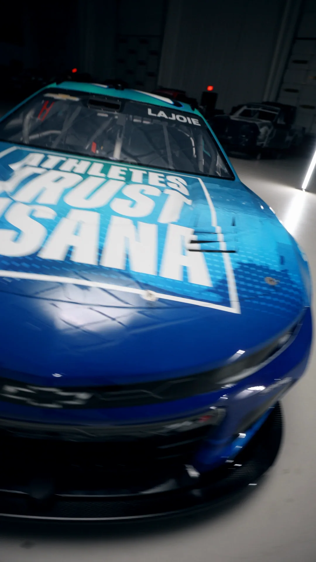 Front of the number 7 car in the shop
