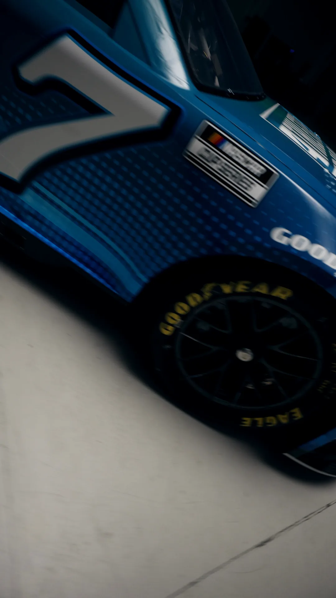 Low angle on the number 7 door and tire