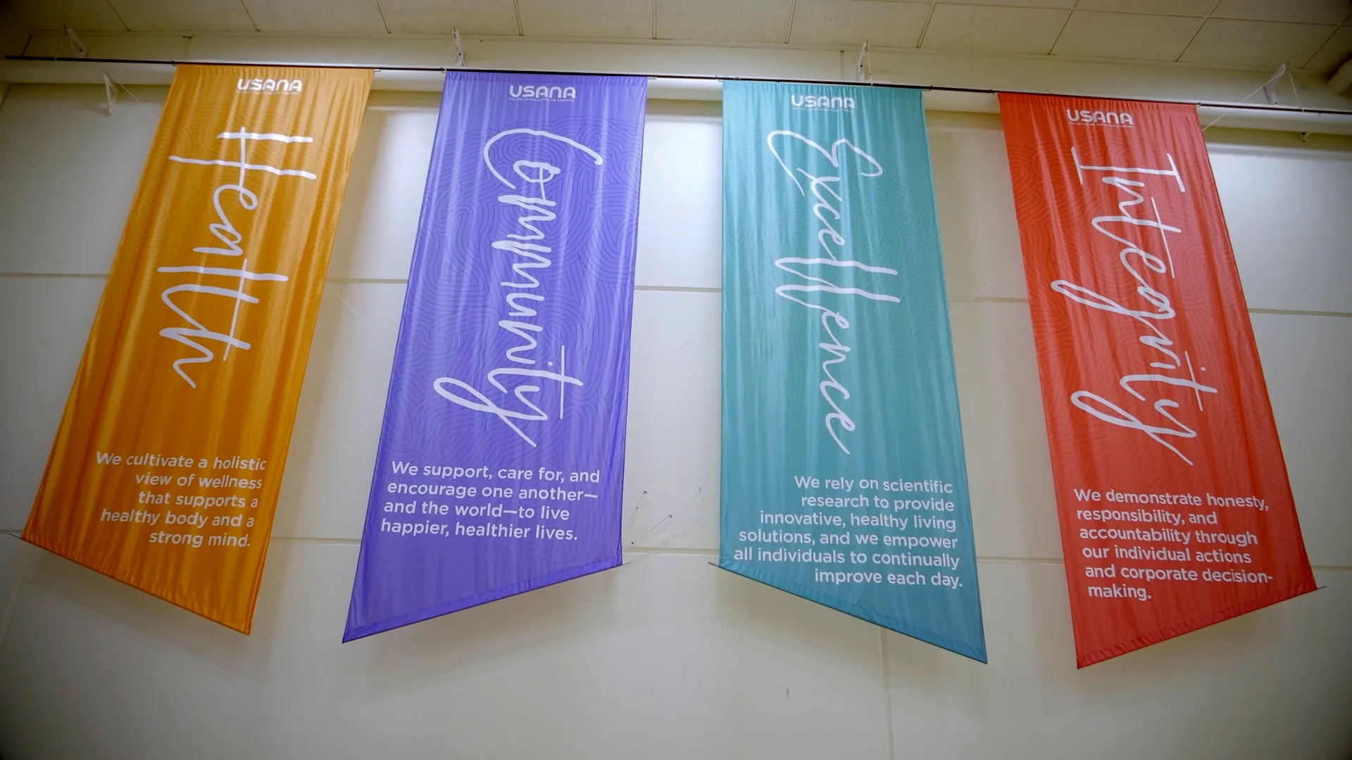 Banners for health, community, excellence and integrity
